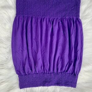 Purple tube top with elastic top and waist band for a flattering look. OS